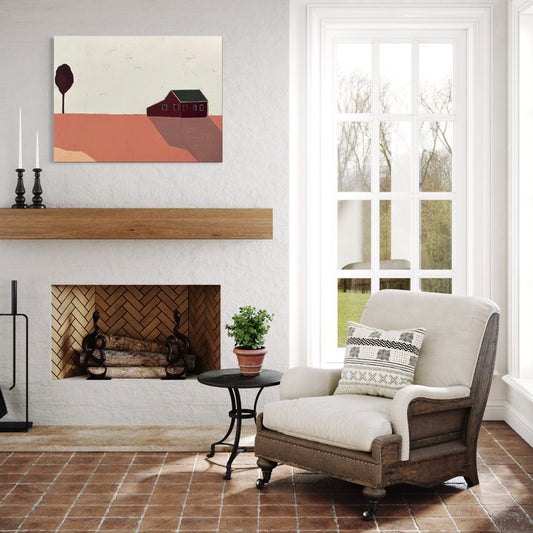 Room with white walls and fireplace with a landscape painting hung above wood mantle.