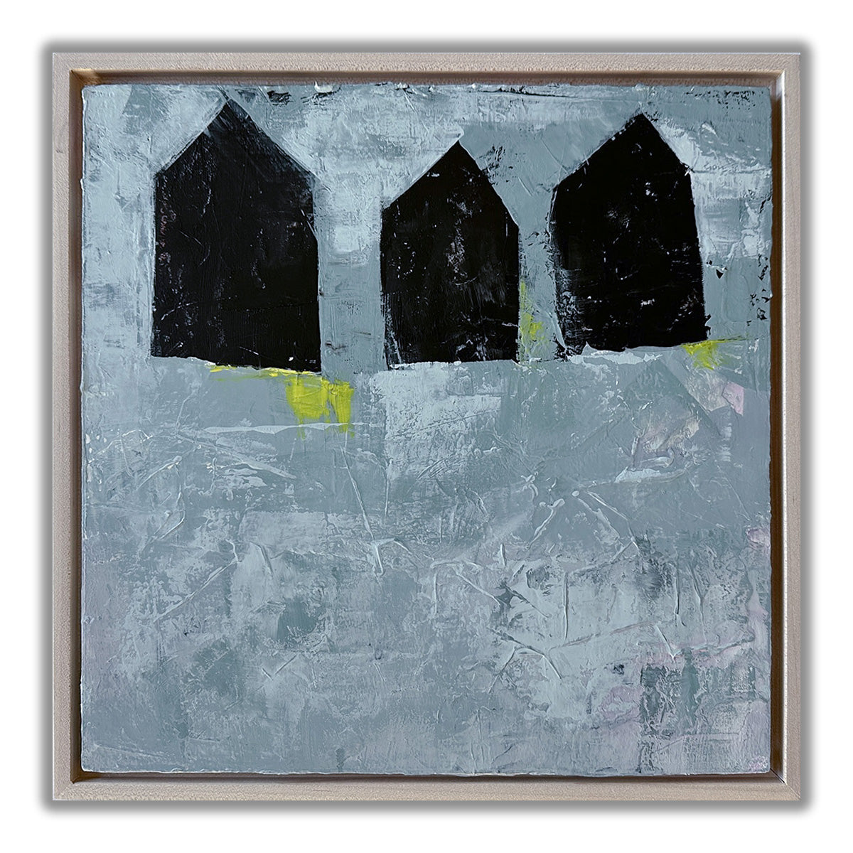 painting of three dark brown abstracted house shapes juxtaposed against a neutral blue-grey background with pops of bright yellow.