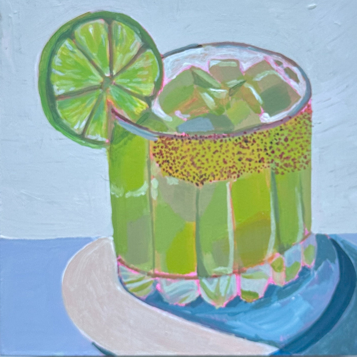 A colorful acrylic painting of a lime margarita in a fluted glass, garnished with a lime wheel, sitting on a blue plate against a light blue background.