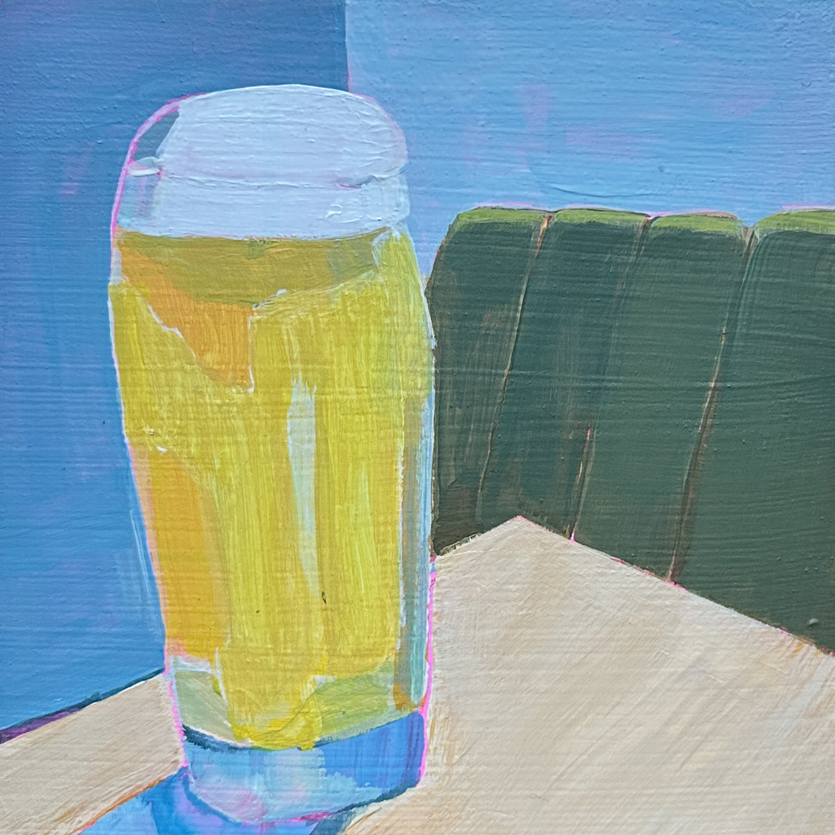 A colorful painted still life of a frothy yellow drink in a clear glass, set against a blue background with a dark green booth and a beige tabletop.