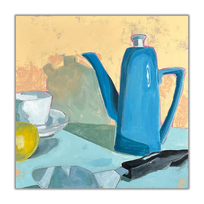 still life in bold colors of blues and peach, blue teapot, white teacup, yellow lemon and a pie knife. 