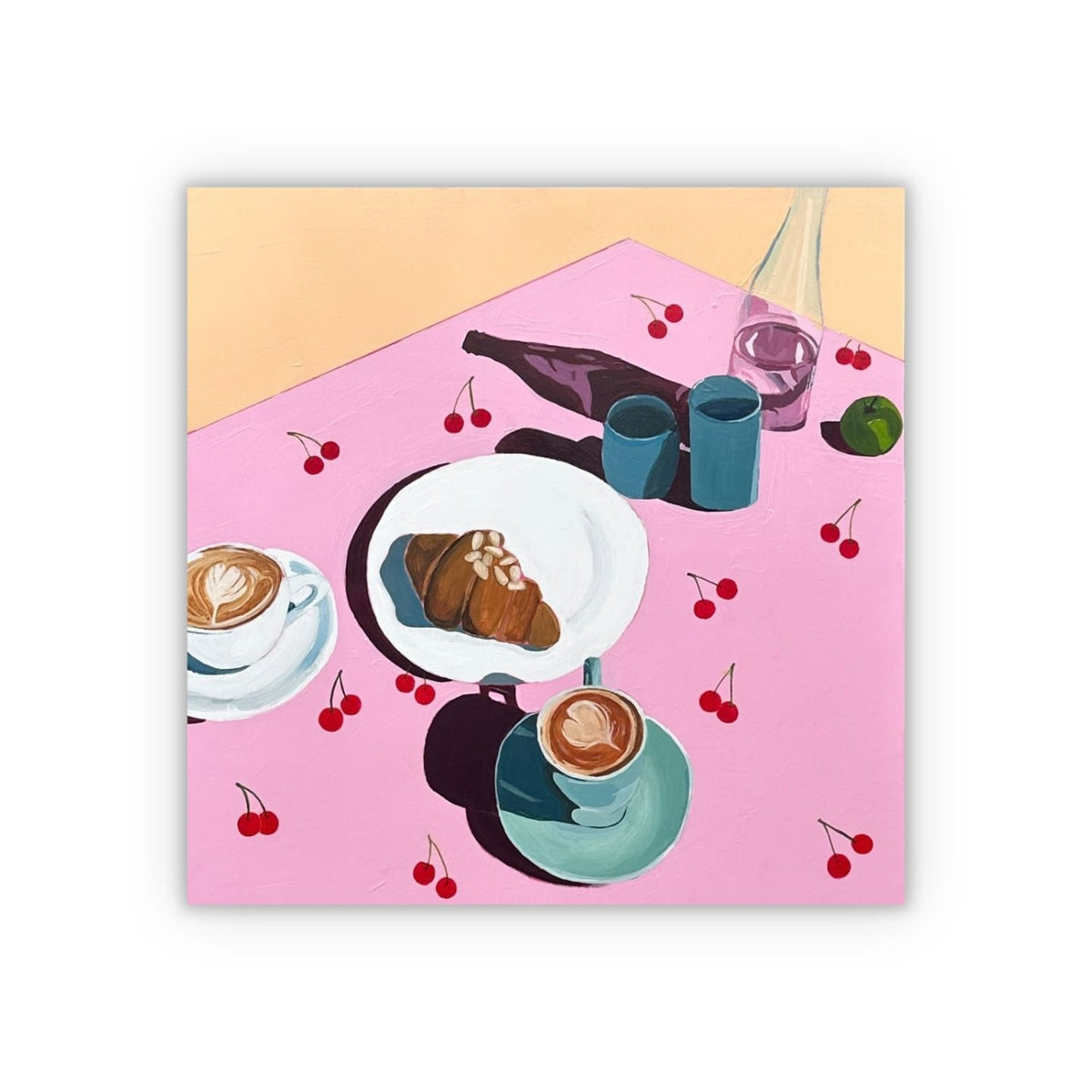 A painting featuring a colorful still life painting of a table setting with coffee cups, a croissant on a plate, cherries, a bottle, and a glass on a pink tabletop, shown as a square on a white background with a drop shadow. 