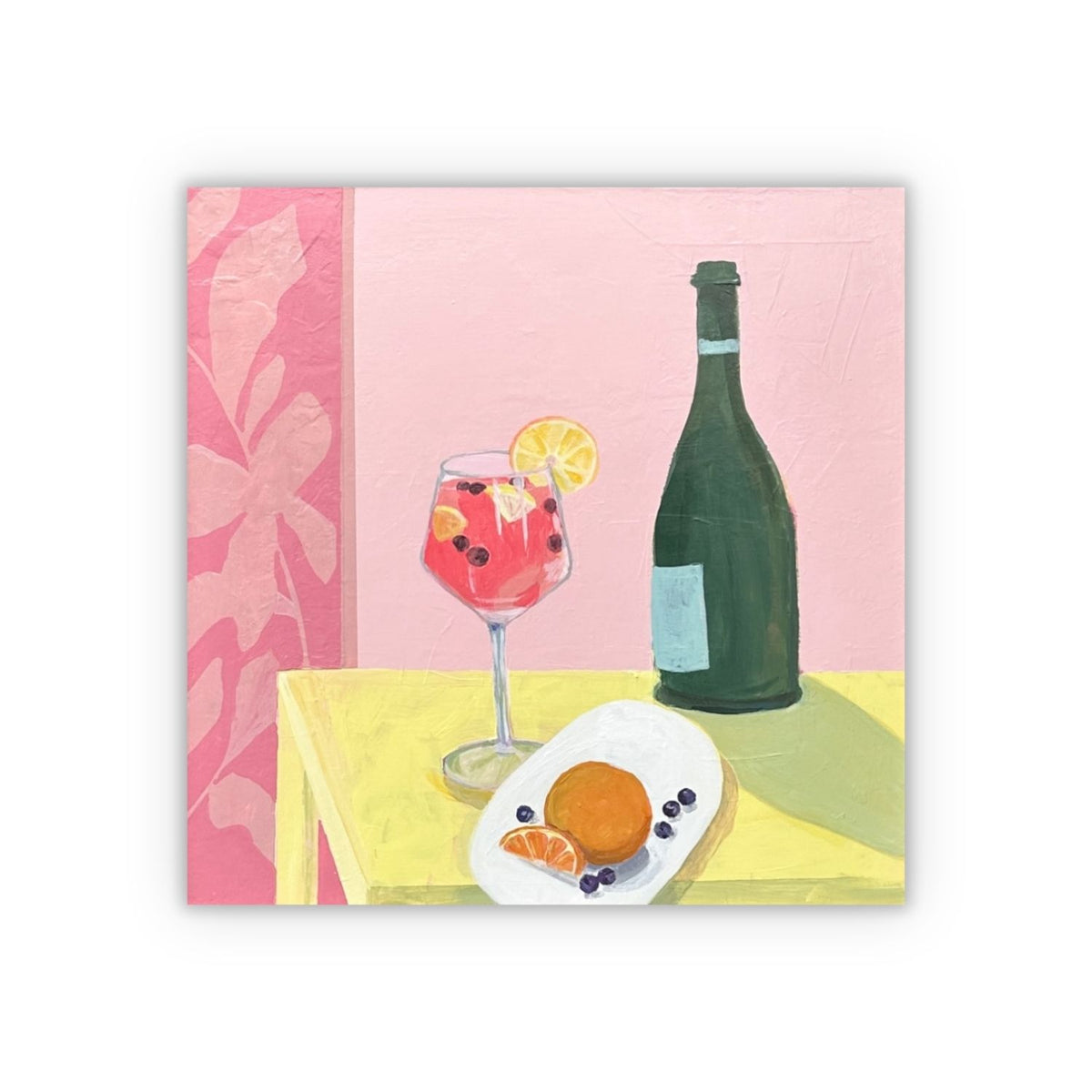 A square painting featuring a still life painting of a pink background, a green wine bottle, a pink cocktail glass with a lemon slice, and a white plate with an orange and blueberries, shown as a square on a white background with a drop shadow. 