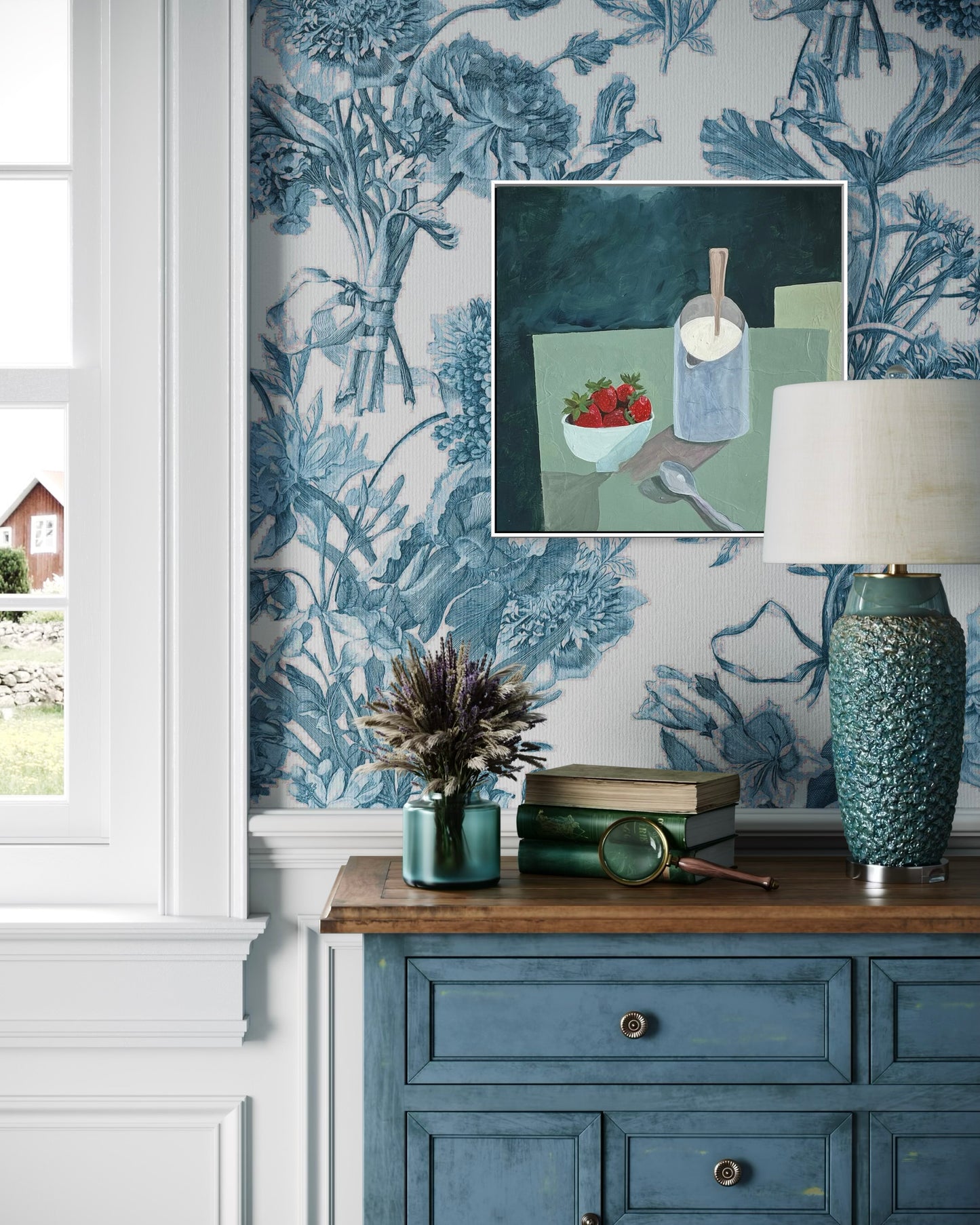 Decorative interior with floral wallpaper, a blue cabinet, and a small painting of a bowl of strawberries and a pitcher of cream.