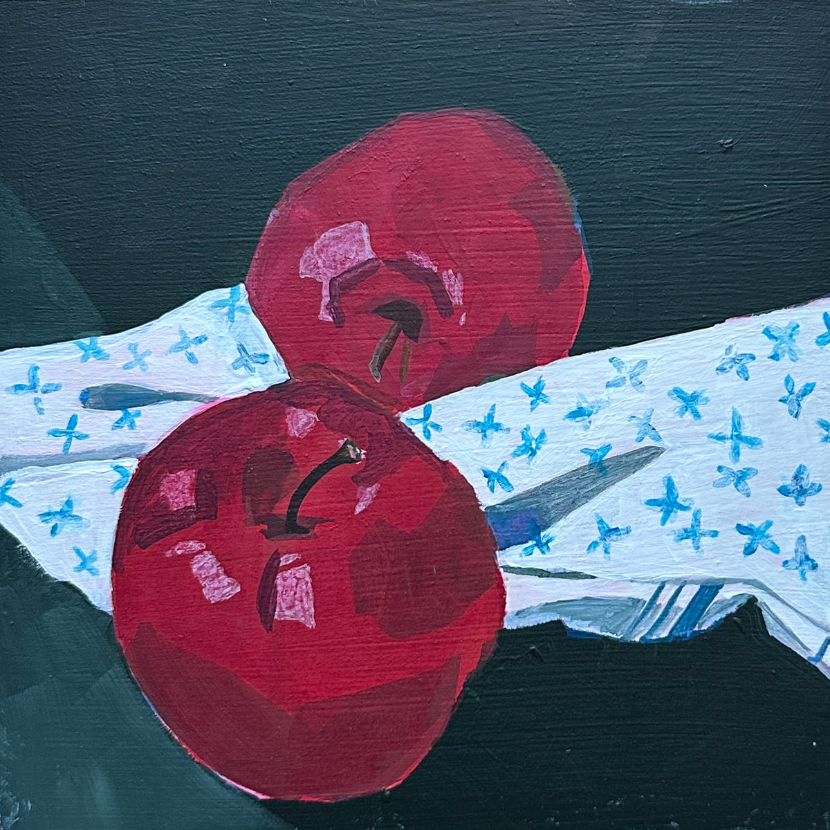 A still life painting of two red apples on a white cloth with blue floral patterns, set against a dark green background.